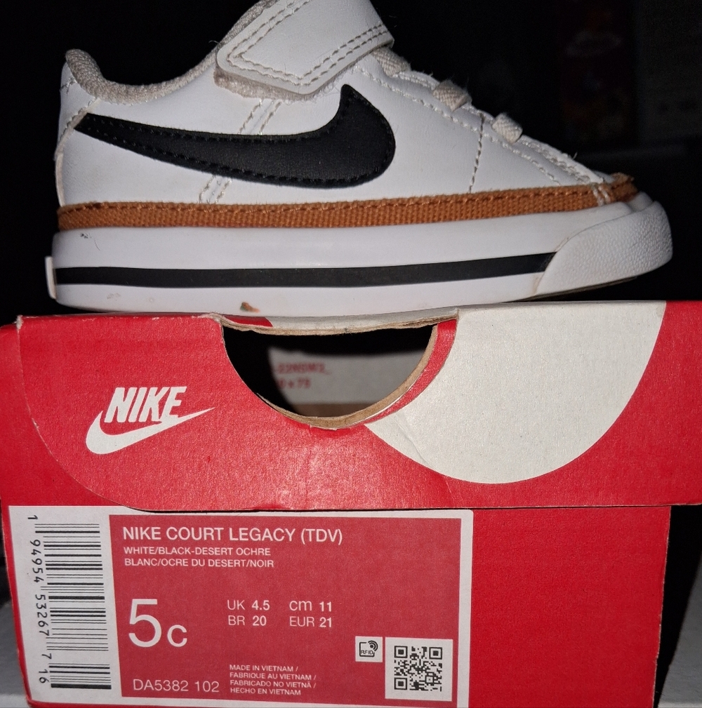 Nike Kids White Sneakers with Black Swoosh and Tan Trim